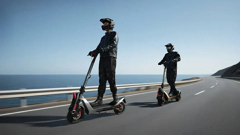 NAVEE UT5 Max on a longer paved road with adult riders