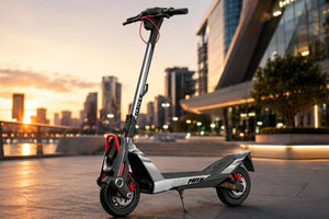 NAVEE electric scooter parked in a modern city plaza at sunset