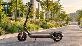 GT5 Max electric scooter parked beside a paved urban commuting route.