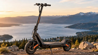 Electric scooter parked at a mountain overlook beside a lake.