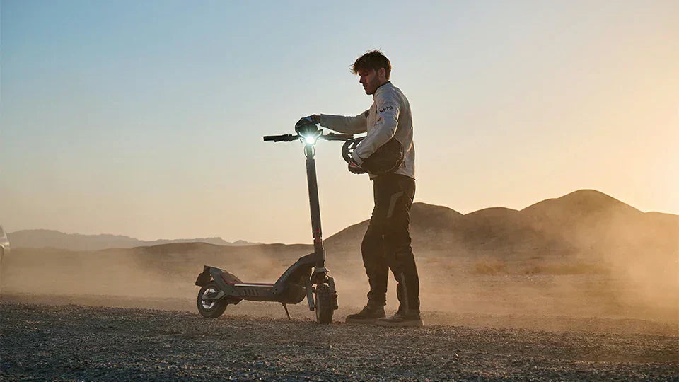 Riding an electric scooter on the wilderness road